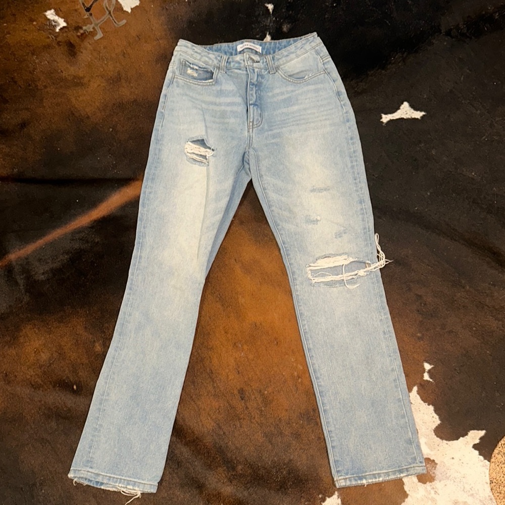 Women's Light Blue Distressed Jeans
